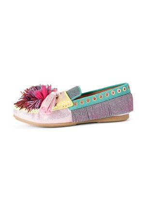 Multi-colored flat shoe with a textured upper, featuring a large decorative tassel, fringe detailing, and metal eyelets along the sides.
