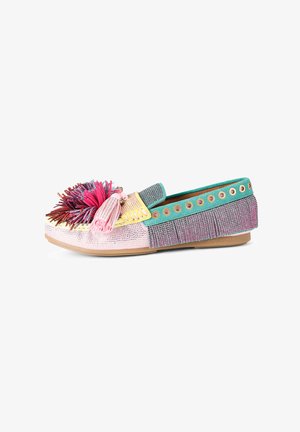 Multi-colored flat shoe with a textured upper, featuring a large decorative tassel, fringe detailing, and metal eyelets along the sides.