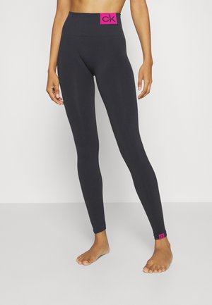 WOMAN SEAMLESS - Legingi — zeķes - black/magenta