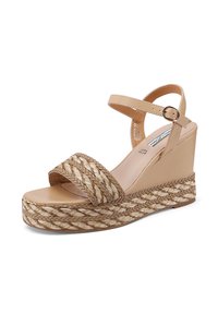 Sandali wedge beige con dettagli in juta intrecciata, fasce larghe, cinturino alla caviglia regolabile e una finitura opaca liscia sulla suola.
