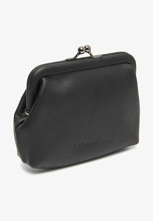 Black leather clutch with a rounded frame closure. Smooth texture, slightly gathered design, and embossed brand name on the front.