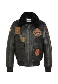 Sort læder bomberjakke med en kunstpels krave, der har flere farverige og strukturerede lapper på forsiden og ærmerne.