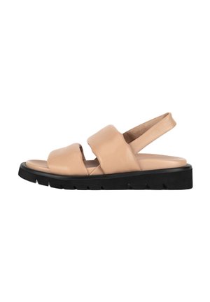 Beige Ledersandalen mit zwei breiten Riemen, offenem Zehenbereich und schwarzer Gummisohle mit einer Struktur aus Rillen für besseren Halt.