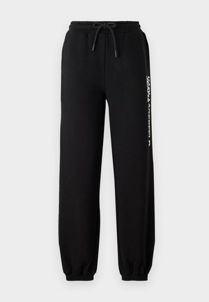 Mustad mustad pant, millel on elastne vöökoht, reguleeritav nöör ja kitsad lõpposad. Vasakul küljel on valge logo.
