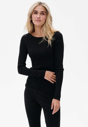 - Sweter