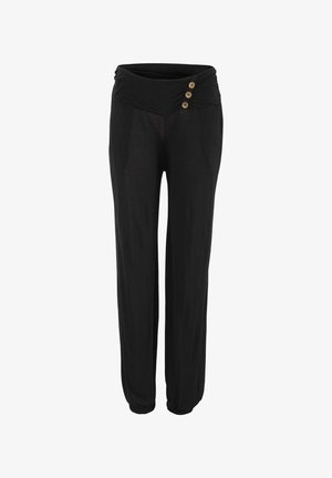 Pantalon noir avec une large ceinture froncée, agrémenté de trois boutons dorés et de poignets élastiques aux chevilles. Texture de tissu douce.