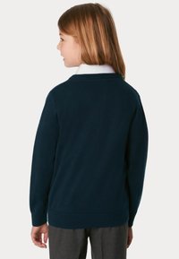 Patron de couture t-shirt bébé boutonné dans le dos Patron de couture t-shirt bébé boutonné dans le dos