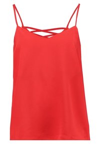 Červená tílko s nastavitelnými tenkými ramínky a křížovým detailem na výstřihu. Vyrobeno z hladkého materiálu s volným střihem.
