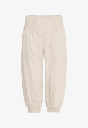 Leinenhose in hellbeige mit elastischem Taillenbund, schmal zulaufenden Beinabschlüssen und subtilem Muster. Glatte Stoffoberfläche.