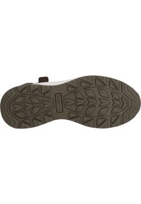 Brun gummiyttersida med ett robust mönster, med en central logotyp, designad för grepp och hållbarhet.