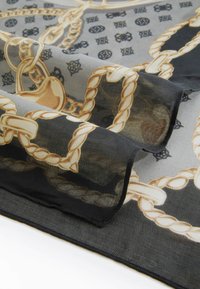 Black and gold patterned scarf with a chain design, made of lightweight fabric, featuring a sheer texture and contrasting stitching details.