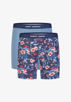Twee paar herenboxershorts: één effen lichtblauw en één marineblauw met een levendig bloemendessin. Elastische taillebanden gemarkeerd met "HAPPY SHORTS."