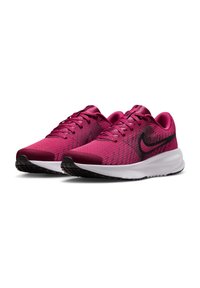 Scarpe sportive rosa con tomaia in tessuto a trama, dettagli neri e suola intermedia bianca. Presentano una punta arrotondata e chiusura con lacci.