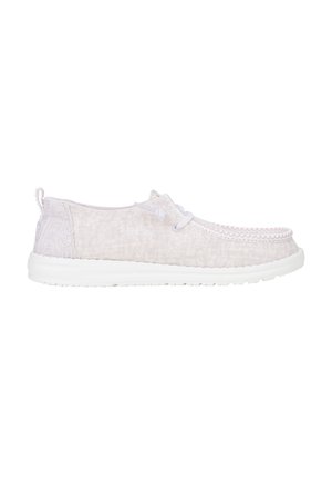Light pink fabric lace-up shoe with white sole, textured upper, decorative stitching along the edge, and patterned heel accent.