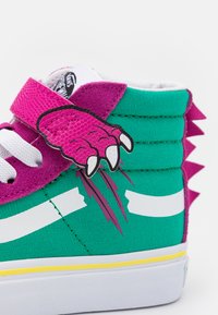 vans dino