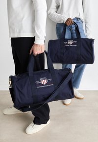 COLOR SHIELD DUFFLE BAG UNISEX - Weekend bag - classic blue