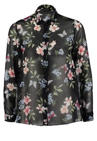 Blouse noire transparente avec des motifs floraux en rose et bleu, dotée d'un devant à boutons et de manches longues, en tissu léger.