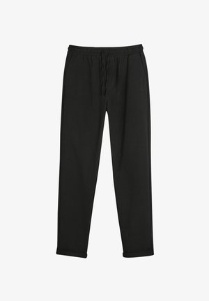 Schwarze Jogginghose aus weichem Stoff, mit einem elastischen Bund und Kordelzug, geraden Beinen und Bündchen am Saum.