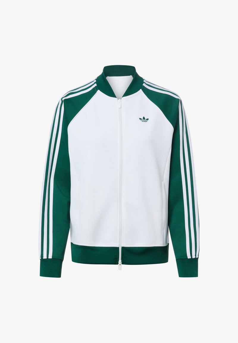 Veste de sport blanche et verte zippée avec manches vertes, bandes blanches, col côtelé, poignets et logo trèfle Adidas sur la poitrine.