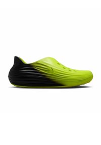 Παπούτσι τύπου slip-on με χαμηλό προφίλ σε νέον πράσινο που ξεθωριάζει σε μαύρο, με υφή στην επιφάνεια και οπές αερισμού.