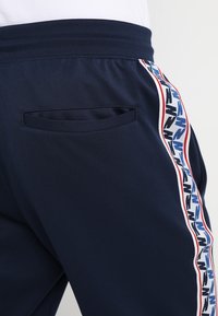 Nike Sportswear Träningsbyxor - dark blue