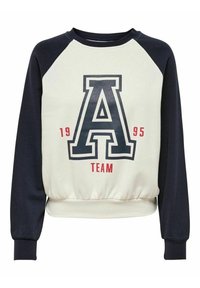 Sudadera con cuello redondo, cuerpo en color crema y mangas raglán en azul marino. Presenta un gran logo "A", "TEAM" y "1995" impresos en rojo en la parte frontal.