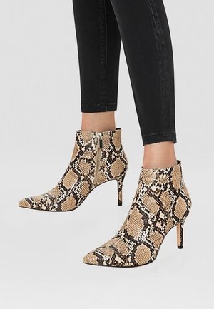 Bottines - gold-coloured