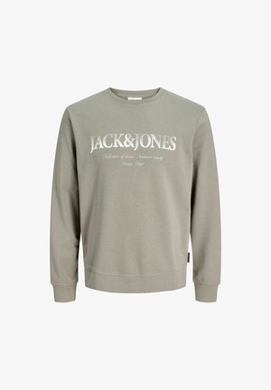 Light olive green long-sleeve sweatshirt with "JACK & JONES" printed in white capital letters across the chest.