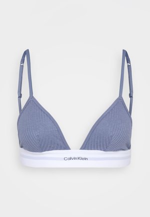 Driehoek bralette van zachtblauwe stof met ribbelstructuur. Witte elastische band aan de onderkant met het Calvin Klein-logo. Verstelbare bandjes.