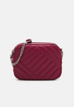 Quilted burgundy faux leather handbag with a silver chain strap, rectangular shape, and zip closure. Textured diagonal pattern on front.