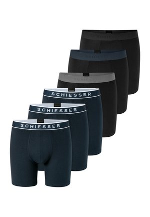 Seis pares de bóxers para hombre en negro y azul oscuro, algunos con cintura contrastante y el nombre de la marca Schiesser en la banda.