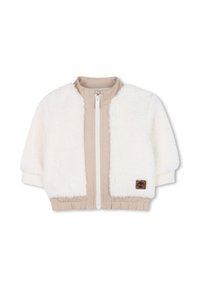 Crème kunstbontjack met beige stofpanelen. Heeft een witte rits, ribbelmanchetten en een elastische tailleband. Timberland logo patch aan de voorkant.