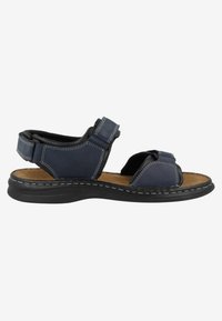 Navy blue leather sandal featuring adjustable straps, a cushioned footbed, and a durable black rubber sole with visible stitching details.