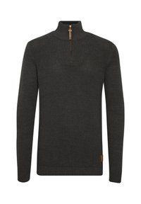 Dark green knit sweater with a high collar, half-zip closure, textured body, and ribbed cuffs and hem. Features a leather logo tag at the bottom.