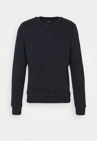 Marinblå sweatshirt gjord av mjukt tyg, med rund halsringning, långa ärmar och ribbade muddar och fåll. Diskret sömnadsdetalj på axlarna.