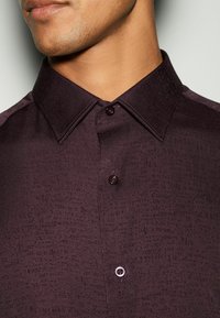 Next Vapaa-ajan kauluspaita - textured fig purple