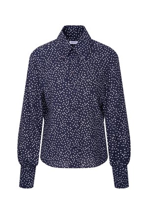 Dunkelblaue Langarmbluse mit weißen unregelmäßigen Punkten, knopfbarer Front und weitem Kragen mit Knopfdetails.