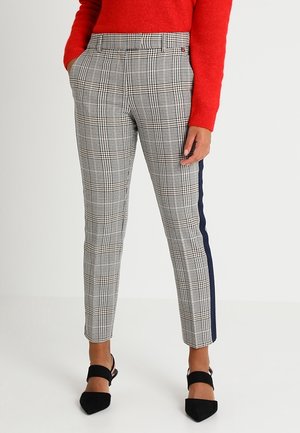 Pantalons à carreaux noirs et blancs avec une coupe slim, dotés d'une rayure latérale navy, de passants de ceinture et de poches avant.
