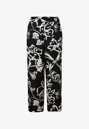 Pantalon noir avec un motif floral blanc, fabriqué en tissu lisse avec une coupe ample et une taille élastique pour le confort.
