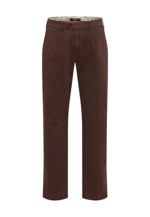 Braune Baumwollhosen mit flachem Bund, seitlichen Taschen und einem gemusterten Innenbund. Gerades Bein, minimale Nähte und saubere Verarbeitung.