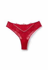 Red lace thong with floral patterns, a scalloped lace edge, and a decorative silver-toned trim across the front. Sheer material, lightweight.