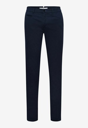 Pantaloni blu navy realizzati in un tessuto morbido e liscio. Caratterizzati da una parte frontale piatta, vestibilità slim e tasche laterali. Design minimale senza motivi visibili.