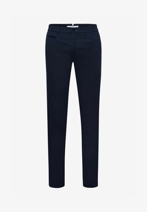 Marineblaue Hose aus einem weichen, glatten Stoff. Mit flachem Bund, schmaler Passform und Seitentaschen. Minimalistisches Design ohne sichtbare Muster.