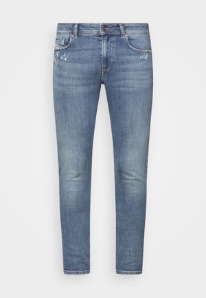 Lichtblauwe denim jeans met een slim fit, met subtiele vervagingen, voorzakken, een ritsluiting en minimale slijtage op de stof.