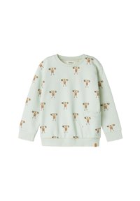 Heled roheline laste dressipluus, millel on pruuniriziga ahvid, kes tõstavad kaalu ja mis katab kogu rõivast. Paremal küljel on väike esi-tasku.