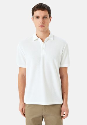 - Koszulka polo