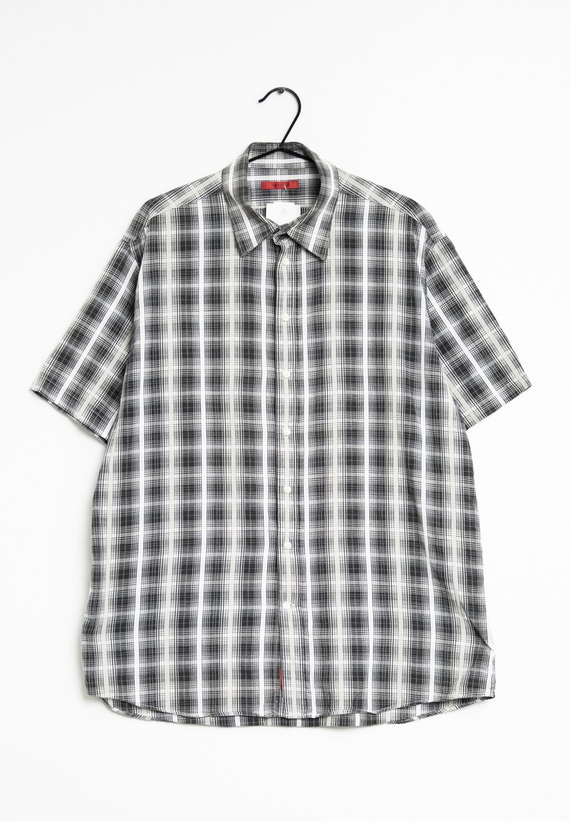 Camicia a maniche corte con motivo a quadri bianco e nero, dotata di chiusura a bottoni, colletto e orlo dritto. Realizzata in tessuto leggero.