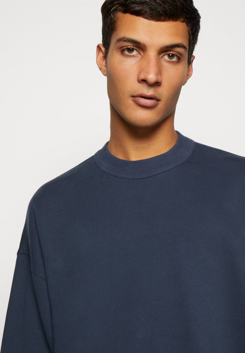 essential open hem crew sweatshirt