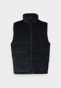 Chaleco acolchado de pana negra con cuello alto, cierre frontal de cremallera y bolsillos laterales, con una superficie texturizada y diseño acolchado.