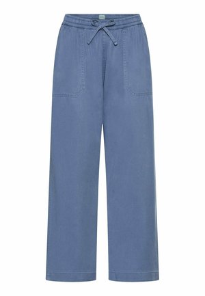 Loose-fit blue pants with elastic waistband and drawstring, featuring front patch pockets and wide straight legs.